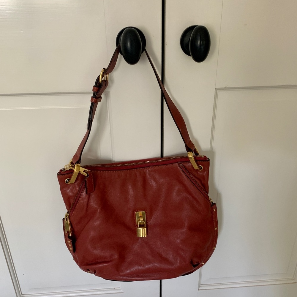 Marc Jacobs shoulder hobo dark raspberry leather. Like new !
